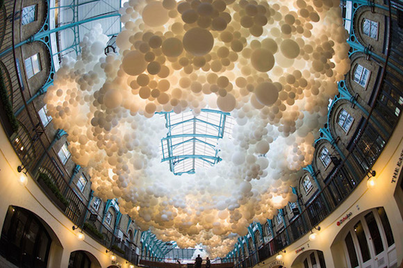 Charles-P-tillon-floats-London-s-Covent-Garden-With-a-Cloud-of-100-000